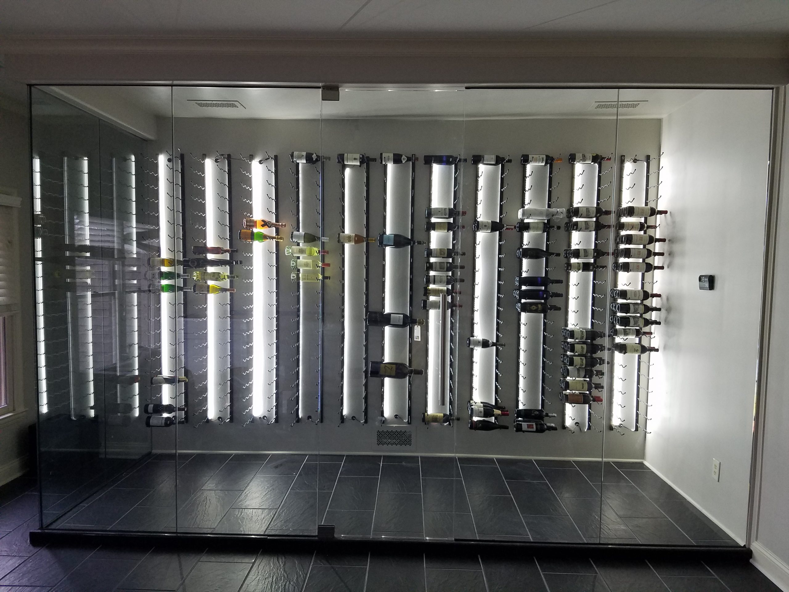 Glass enclosed sales wine wall cost